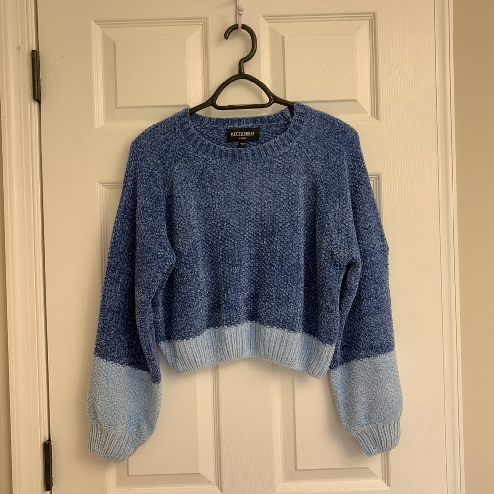 Kittenish “Color block his number” sweater